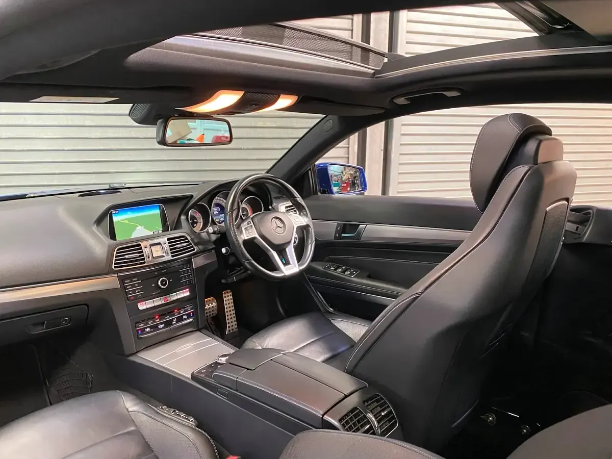 Used Mercedes E220 AMG line 175 HP (128 kW) 2016 Blue Coupe