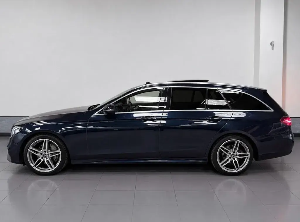 Used Mercedes E220 AMG Line Premium 194 HP (142 kW) 2019 Blue Estate