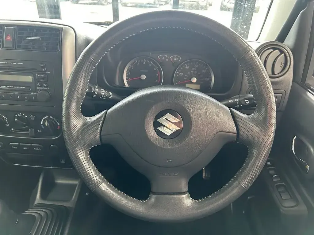 Used Suzuki Jimny SZ4 85 HP (62 kW) 2011 Black SUV