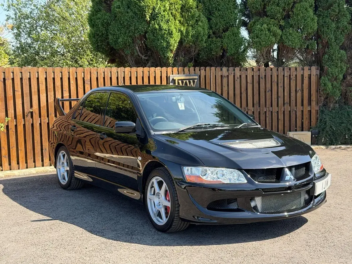 Used Mitsubishi Lancer 261 HP (191 kW) 2004 Black Sedan