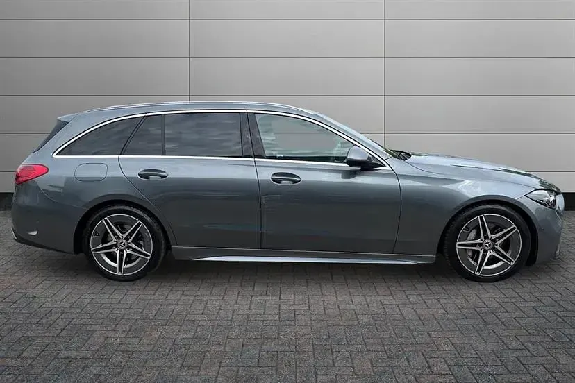 Used Mercedes C300 AMG line 258 HP (189 kW) 2022 Selenite grey Estate