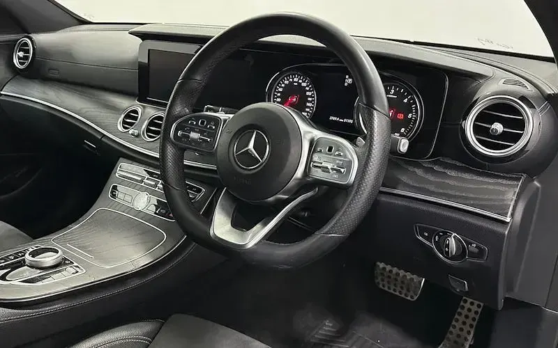Used Mercedes E220 AMG line 194 HP (142 kW) 2018 Blue Sedan