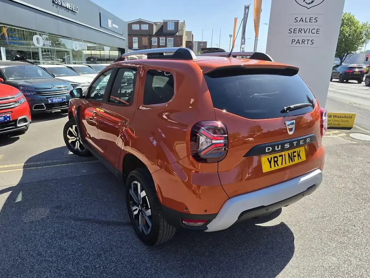 Second-hand Dacia Duster Prestige 113 CP (83 kW) 2021 Portocaliu SUV