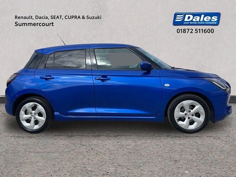 Used Suzuki Swift 82 HP (60 kW) 2024 Premium metallic  frontier blue pearl Hatchback