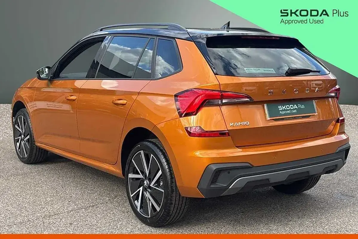 Used Skoda Kamiq Design Edition 85 HP (62 kW) 2026 Phoenix orange metallic black magic pearl effect SUV