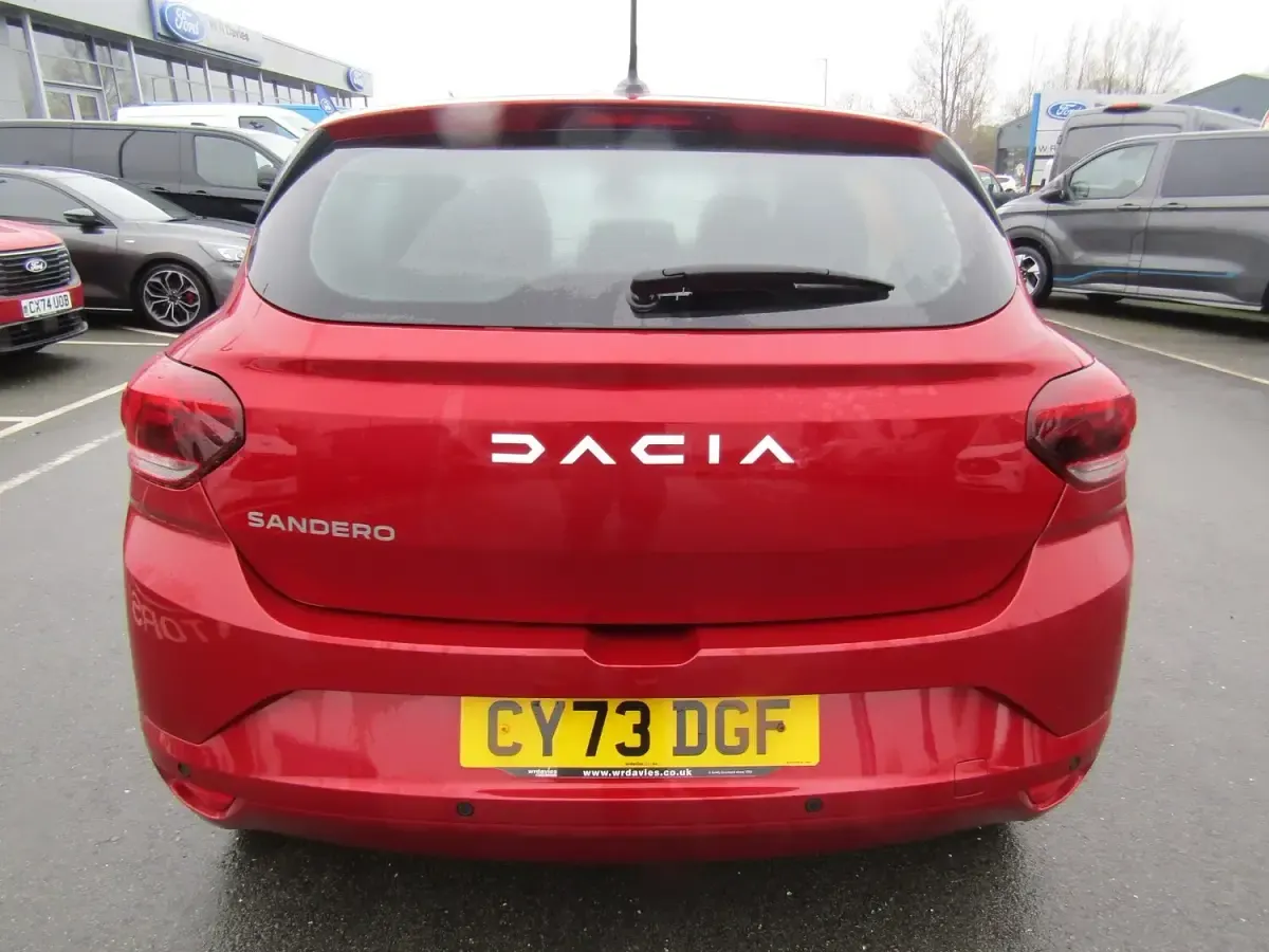 Used Dacia Sandero Expression 100 HP (73 kW) 2023 Fusion red Hatchback