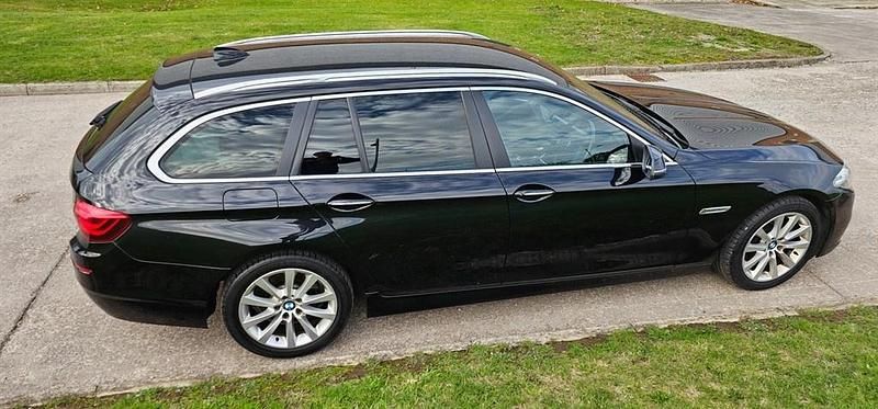 Używany BMW 520 Comfort Edition 181 KM (133 kW) 2014 Czarny Kombi