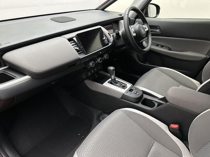 Used Honda Jazz Hybrid 109 HP (80 kW) 2023 Premium crystal red Hatchback