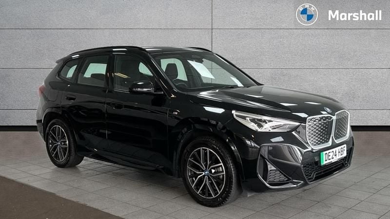 Black sapphire Used 2024 BMW iX1 M Sport SUV | £31,840 (Fair price) - Image 1/4