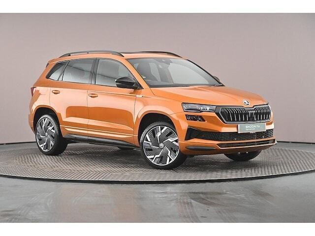 Phoenix orange metallic Used 2024 Skoda Karoq SportLine SUV | £27,499 (Fair price) - Image 1/4