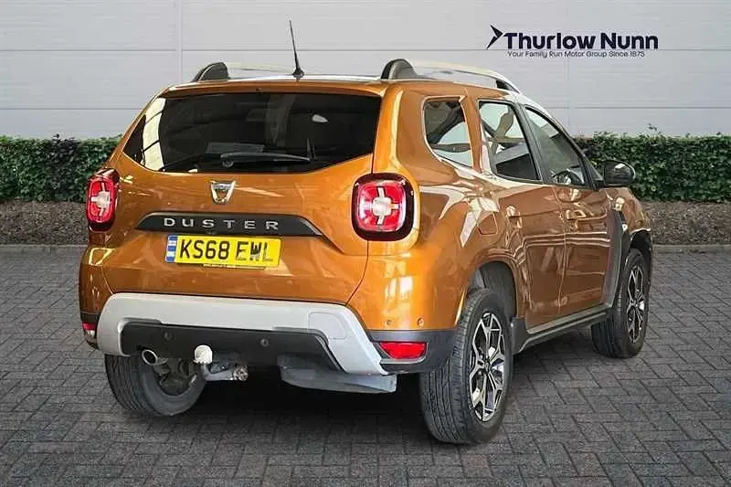 Second-hand Dacia Duster Prestige 115 CP (84 kW) 2018 Portocaliu SUV