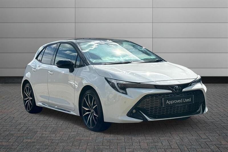 Pure white with black roof Used 2023 Toyota Corolla Sport Hatchback | £23,395 (Good price) - Image 1/4