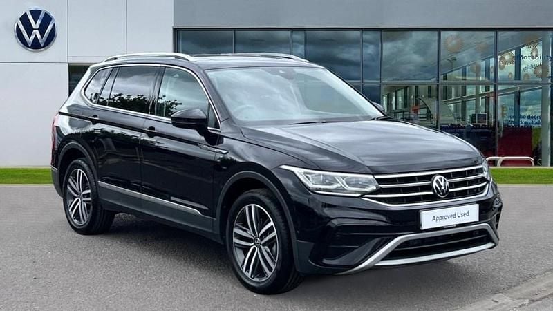 Deep black pearl Used 2024 VW Tiguan Allspace Elegance SUV | £32,486 (Fair price) - Image 1/4