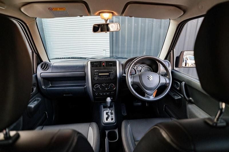 Used Suzuki Jimny SZ4 85 HP (62 kW) 2015 Black and grey SUV