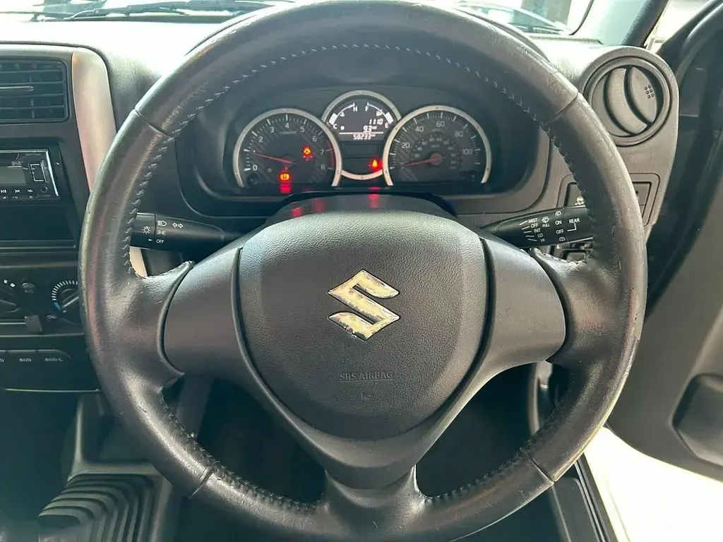 Used Suzuki Jimny SZ4 85 HP (62 kW) 2016 Black/grey SUV