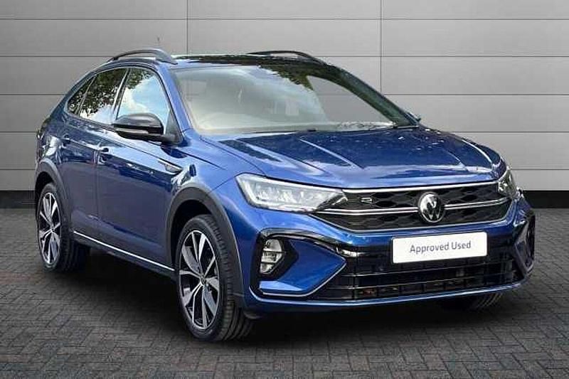 Reef blue with deep black pearl roof Used 2022 VW Taigo R-line SUV | £20,895 (Fair price) - Image 1/4
