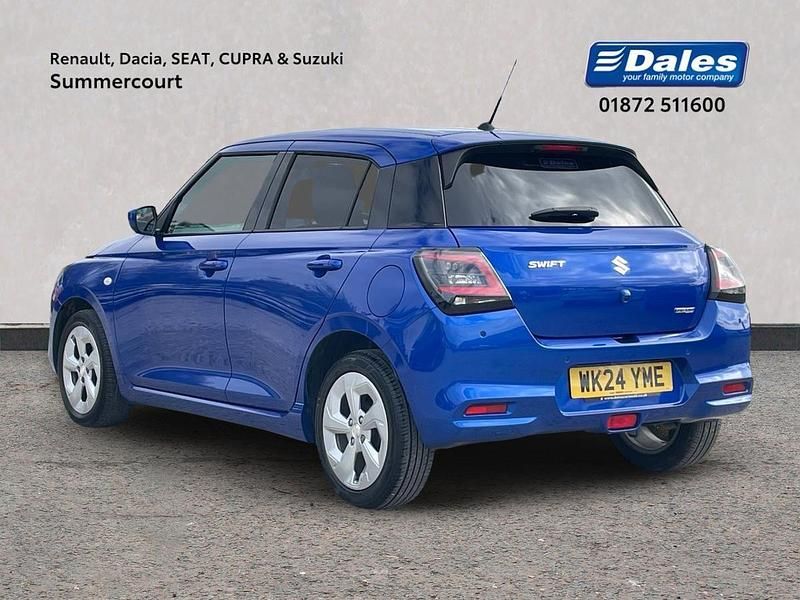 Used Suzuki Swift 82 HP (60 kW) 2024 Premium metallic  frontier blue pearl Hatchback