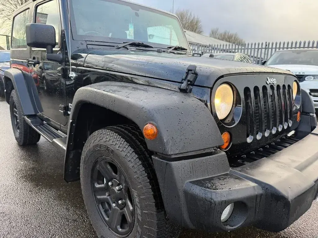 Begagnad Jeep Wrangler Sport 197 HK (144 kW) 2012 Svart SUV