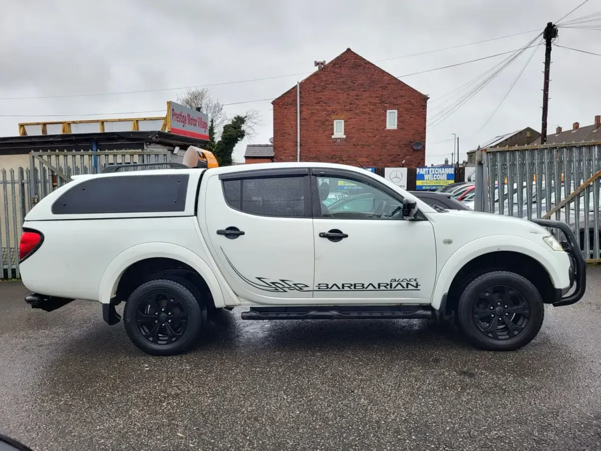 Używany Mitsubishi L200 176 KM (129 kW) 2013 Biały Pickup