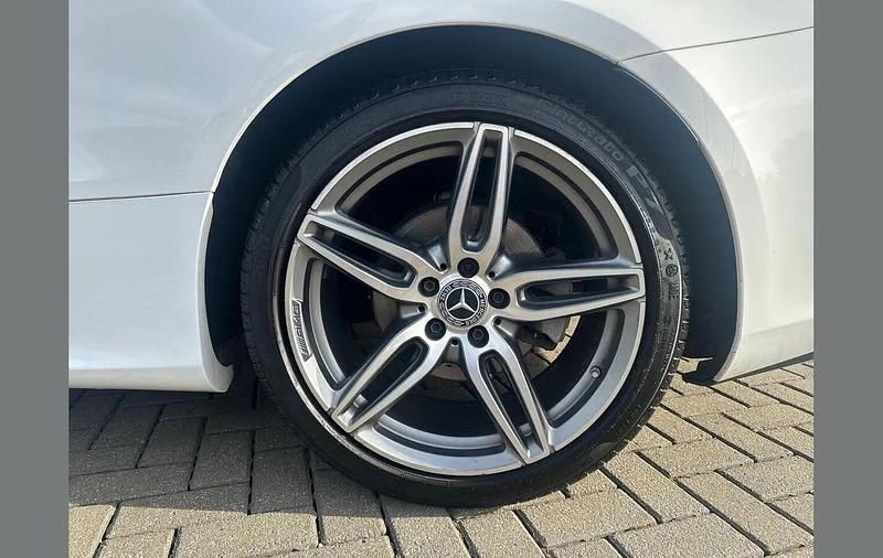Used Mercedes E220 AMG Line Premium 194 HP (142 kW) 2020 Polar white Coupe