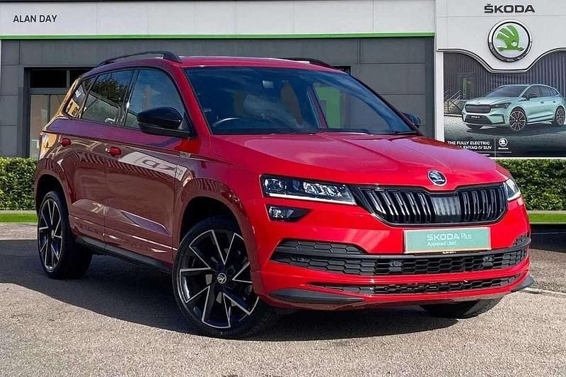Velvet red metallic Used 2022 Skoda Karoq SportLine SUV | £21,199 (Fair price) - Image 1/4