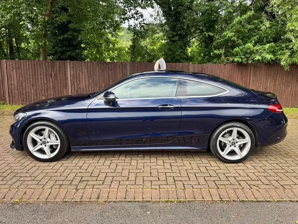 Used Mercedes C220 AMG line 170 HP (125 kW) 2017 Blue Coupe
