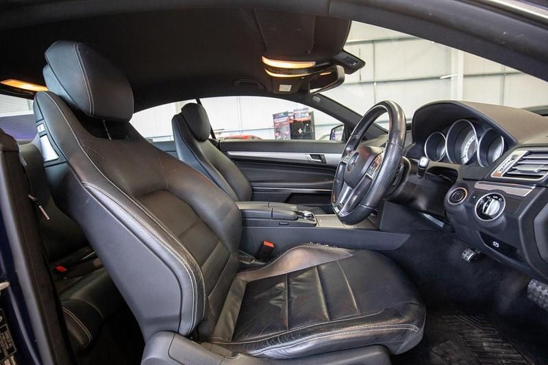 Used Mercedes E250 AMG line 204 HP (150 kW) 2014 Blue Coupe