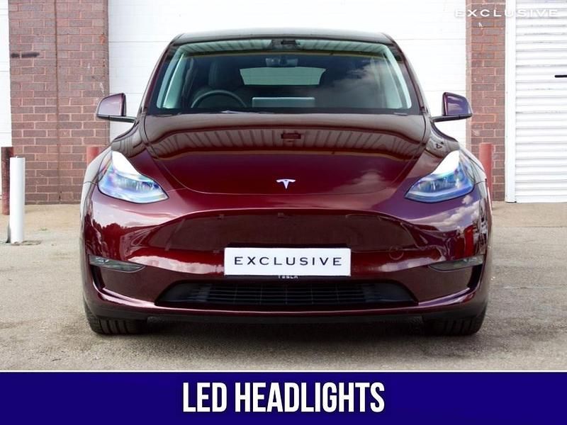 Used Tesla Model Y Performance 286 kW (389 HP) 2025 Red SUV