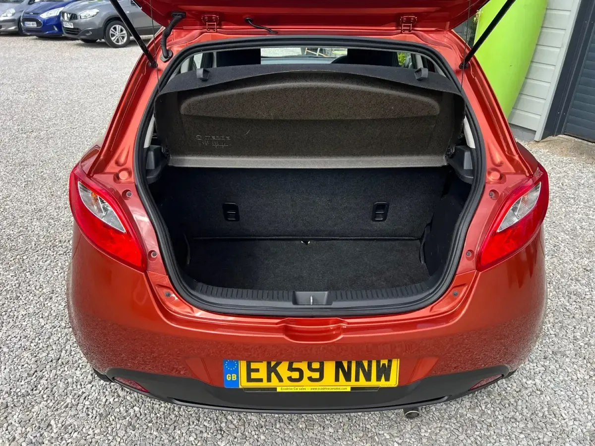 Usado Mazda 2 75 HP (55 kW) 2009 Laranja Citadino