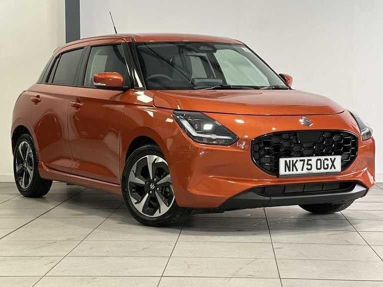 Used Suzuki Swift 82 HP (60 kW) 2025 Flame orange pearl metallic Hatchback