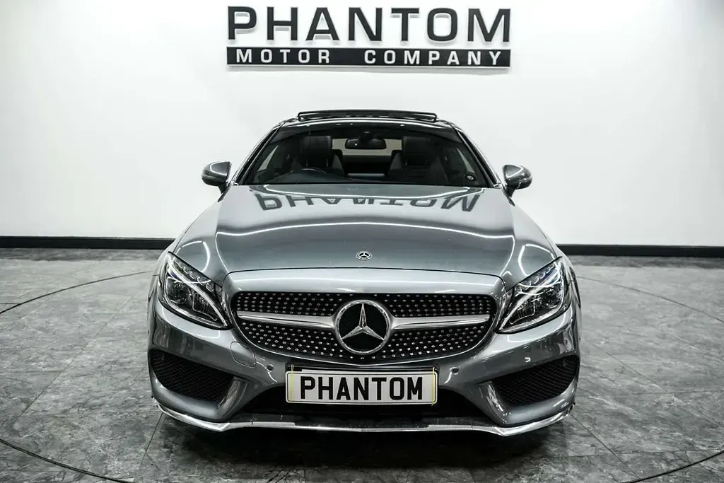 Usado Mercedes C220 AMG line 170 CV (125 kW) 2018 Gris Coupe