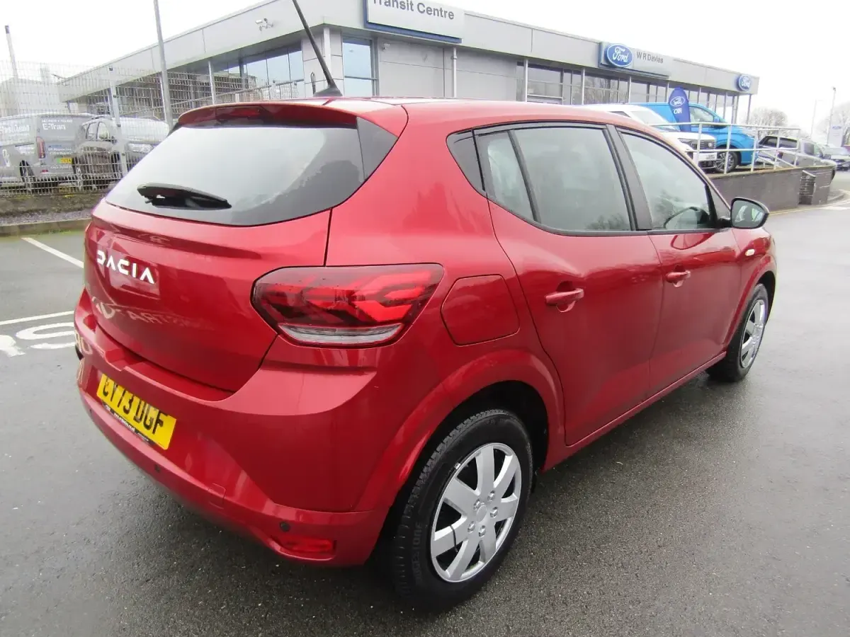Used Dacia Sandero Expression 100 HP (73 kW) 2023 Fusion red Hatchback
