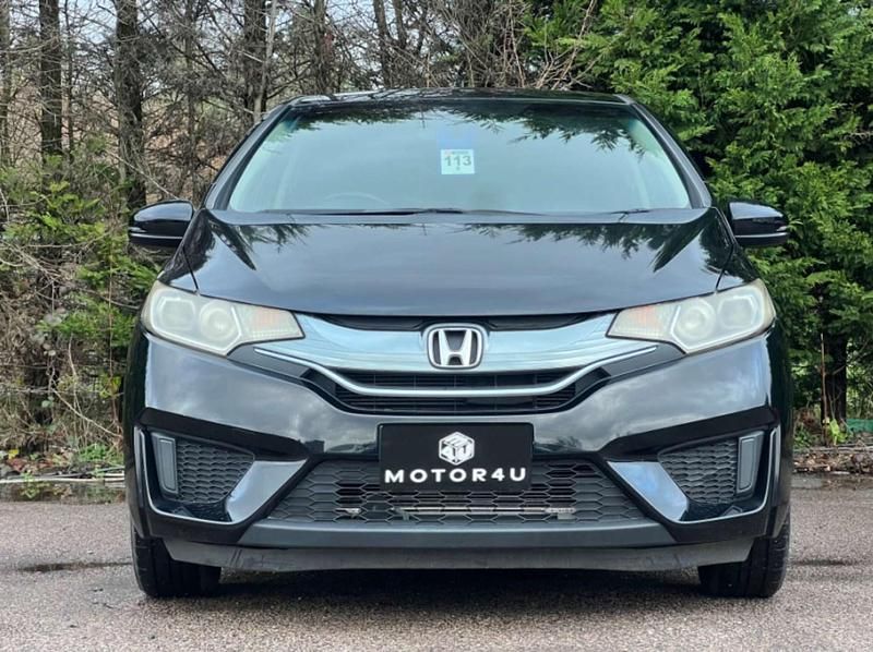 Second-hand Honda Jazz Hybrid 132 CP (97 kW) 2014 Negru Hatchback