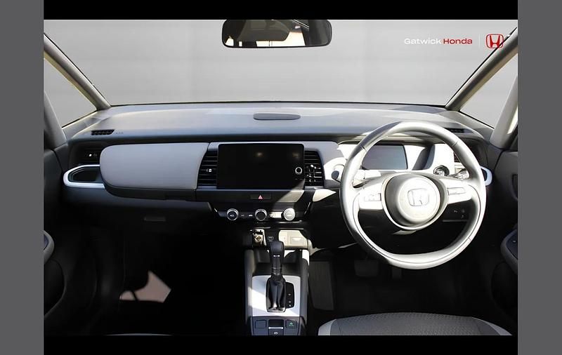 Used Honda Jazz Hybrid 109 HP (80 kW) 2023 Crystal red Hatchback