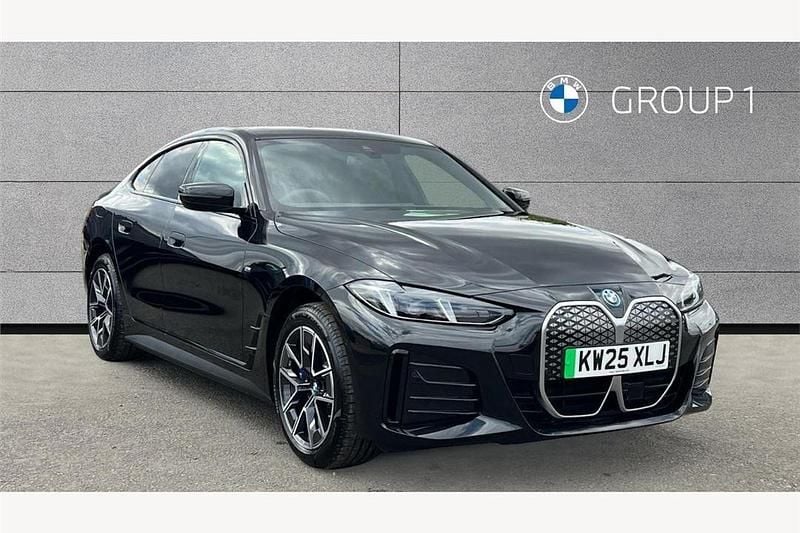 Black sapphire metallic paint New 2025 BMW i4 M Sport Sedan | £41,993 (Fair price) - Image 1/4