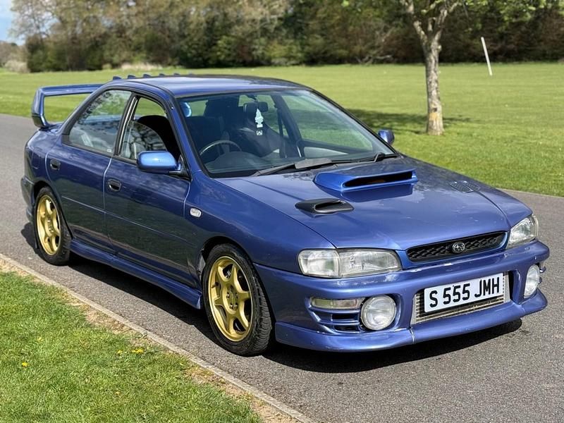Begagnad Subaru Impreza 1998 Blå Sedan