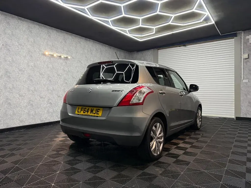 Usado Suzuki Swift SZ4 94 HP (69 kW) 2014 Cinzento Citadino