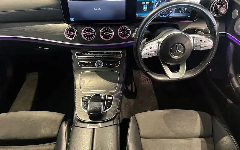 Used Mercedes E400 AMG line 340 HP (250 kW) 2020 Blue Coupe