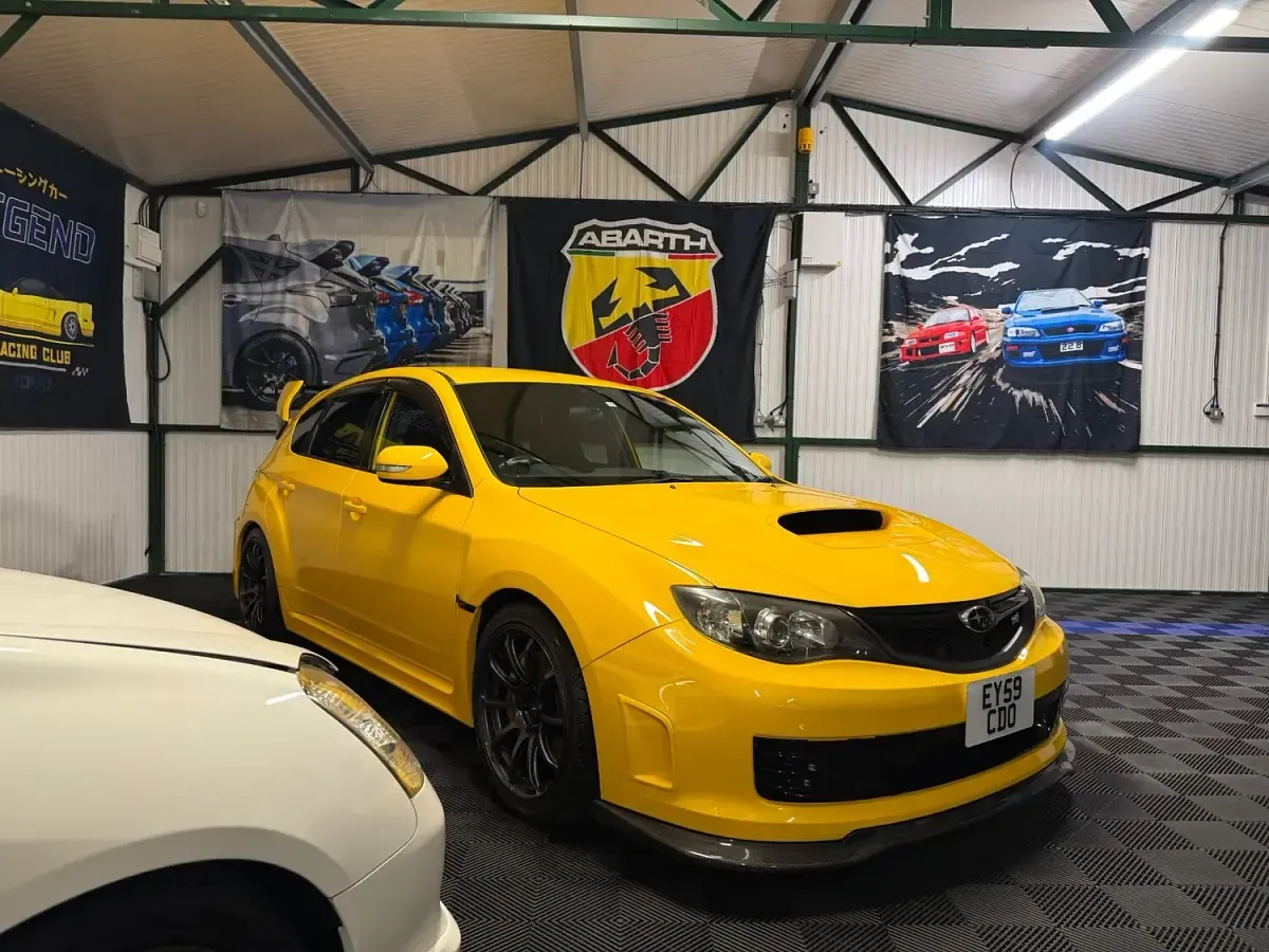 Used Subaru WRX STI 84 HP (61 kW) 2009 Yellow Hatchback