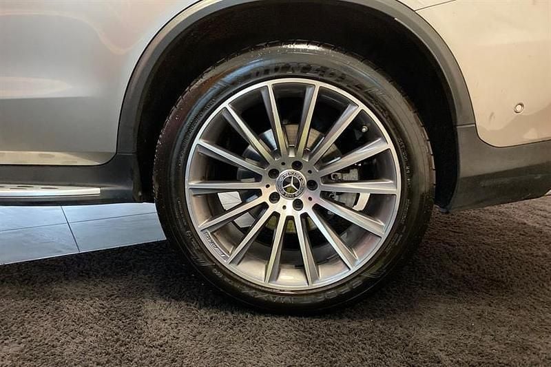 Used Mercedes GLC300 AMG Line Premium 258 HP (189 kW) 2022 Mojave silver Coupe