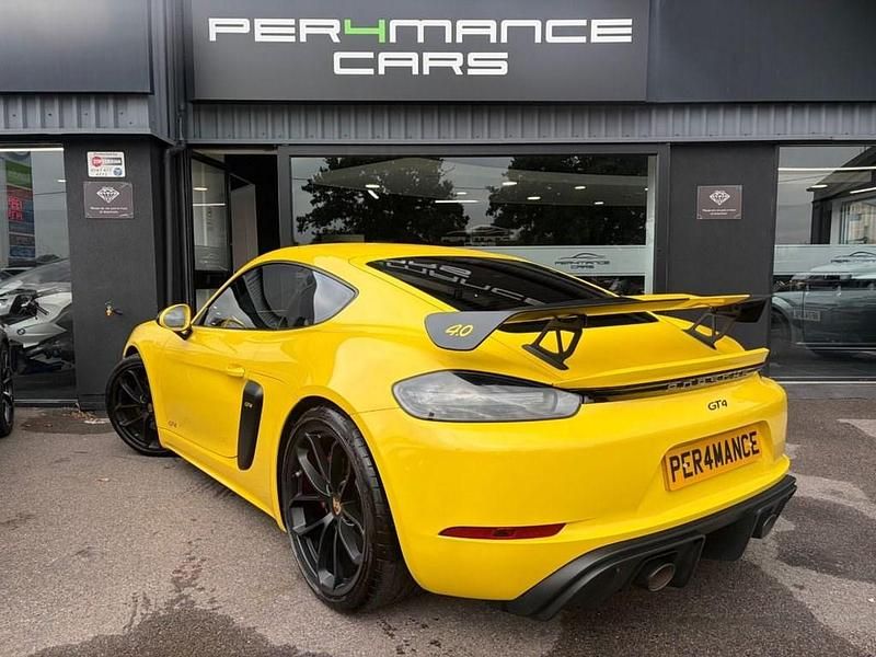 Used Porsche 718 Cayman 420 HP (308 kW) 2021 Yellow Coupe
