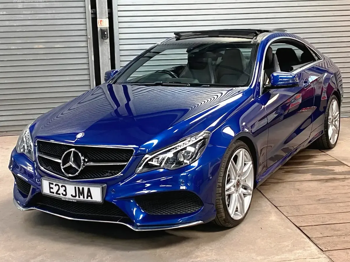 Used Mercedes E220 AMG line 175 HP (128 kW) 2016 Blue Coupe