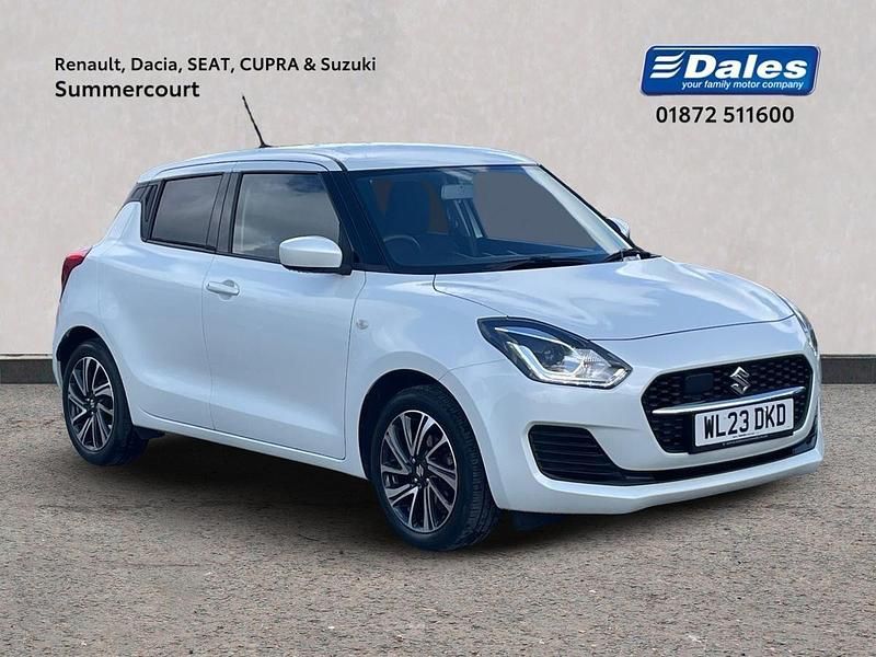 Pearl pure white Used 2023 Suzuki Swift SZ-L Hatchback | £13,500 (A bit pricey) - Image 1/4