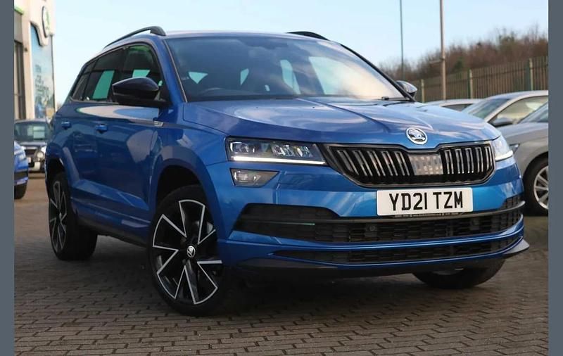 Race blue metallic Used 2021 Skoda Karoq SportLine SUV | £20,495 (Fair price) - Image 1/4