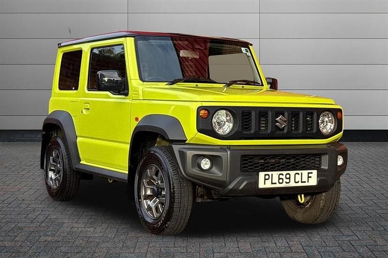Kinetic yellow with blueish black pearl metallic r Used 2020 Suzuki Jimny SZ5 SUV | £29,295 (A bit pricey) - Image 1/2