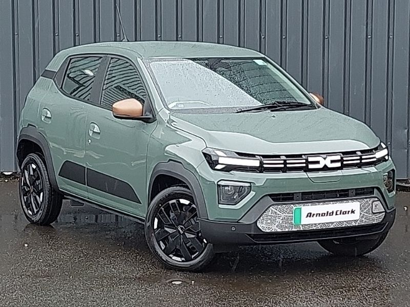 Metallic khaki New 2025 Dacia Spring Extreme Hatchback | £13,998 (Fair price) - Image 1/4