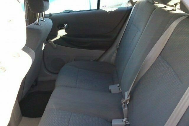 Begagnad Mazda 323 2003 Halvkombi