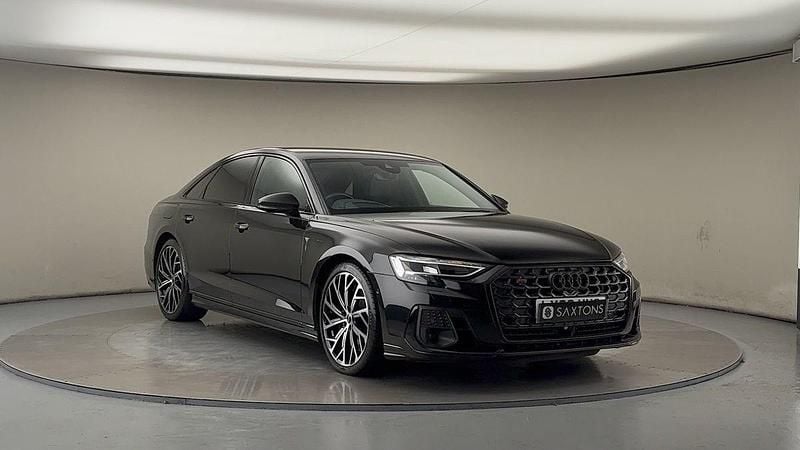 Mythos black metallic/mythos black metallic Used 2023 Audi S8 Black Edition Sedan | £63,700 - Image 1/4