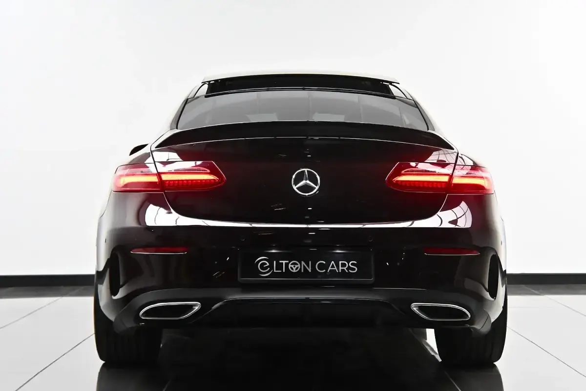 Used Mercedes E220 AMG Line Premium Plus 194 HP (142 kW) 2018 Red Coupe