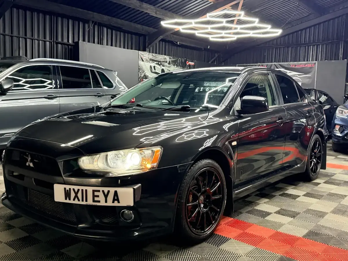 Used Mitsubishi Lancer 240 HP (176 kW) 2011 Black Sedan